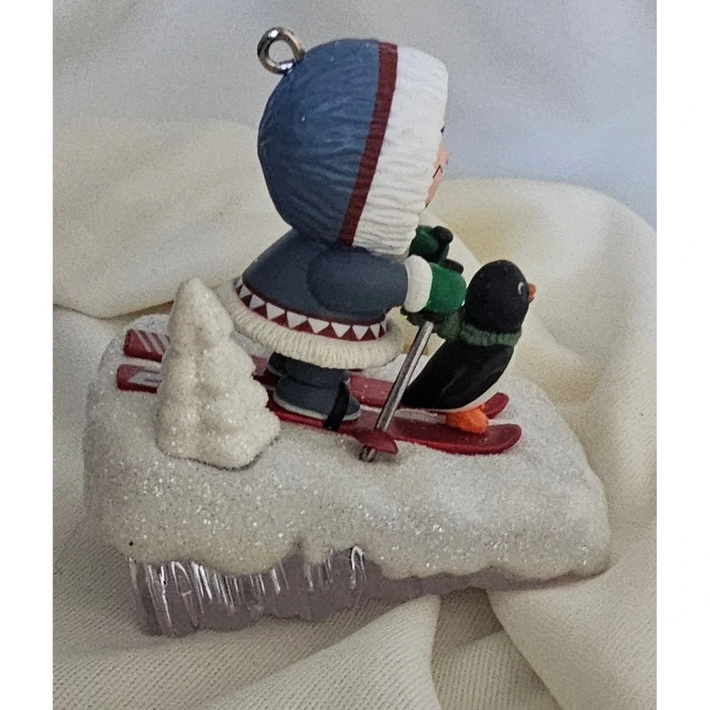 Hallmark Keepsake 2009 Eskimo and Penguin Skiing Christmas Ornament Winter Decor